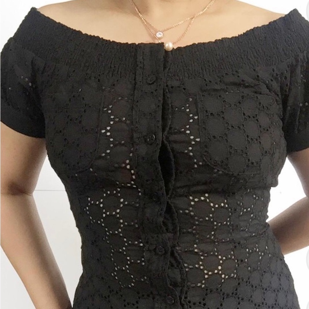 Eyelet material, off shoulder style.cute pockets detail.This is more on XS